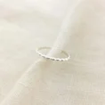 The Aqua Ring features a fluid design crafted in 925 sterling silver.