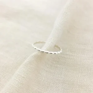 The Aqua Ring features a fluid design crafted in 925 sterling silver.